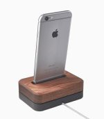 A wooden dock with an iphone on top of it.