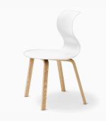 A white chair with wooden legs on top of the floor.