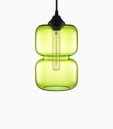 A green glass lamp hanging from the ceiling.