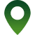 A green map pin icon on a black background